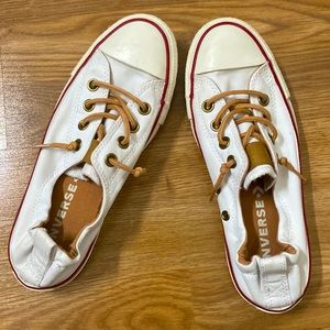 Converse and gently worn.